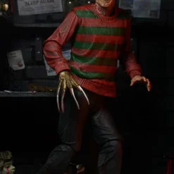 NECA - Nightmare On Elm Street - Ultimate Freddy 7" Action Figure