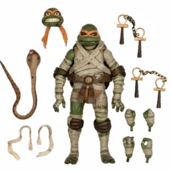 NECA - Universal Monsters X TMNT - Ultimate Michelangelo Mummy 7" Action Figure (Pre-Order Ships October) Mego