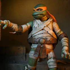 NECA - Universal Monsters X TMNT - Ultimate Michelangelo Mummy 7" Action Figure (Pre-Order Ships October) Mego 10 NECA - Universal Monsters X TMNT - Ultimate Michelangelo Mummy 7